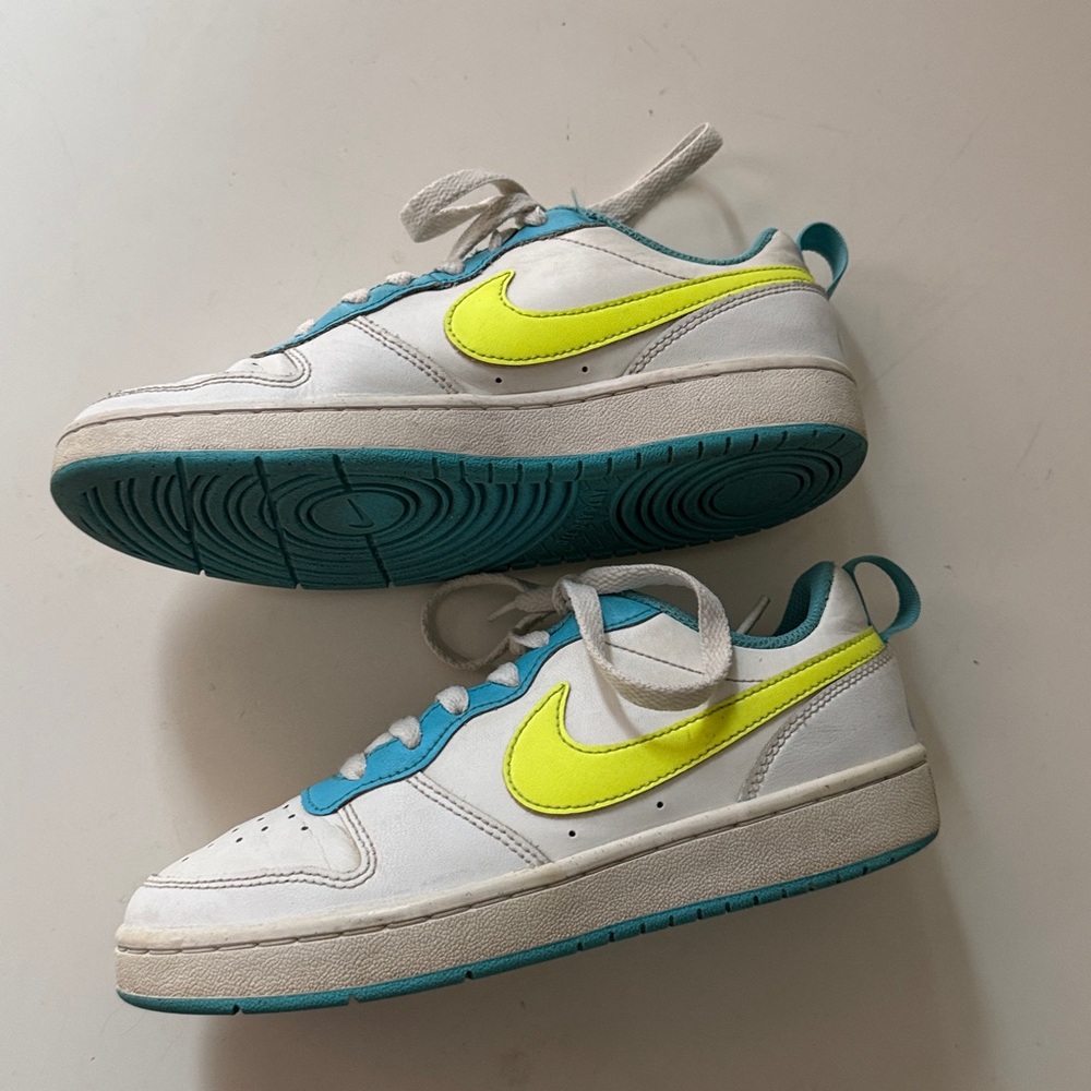 Boys size 4.5 court nike sneakers neon yellow and blue. Light wear